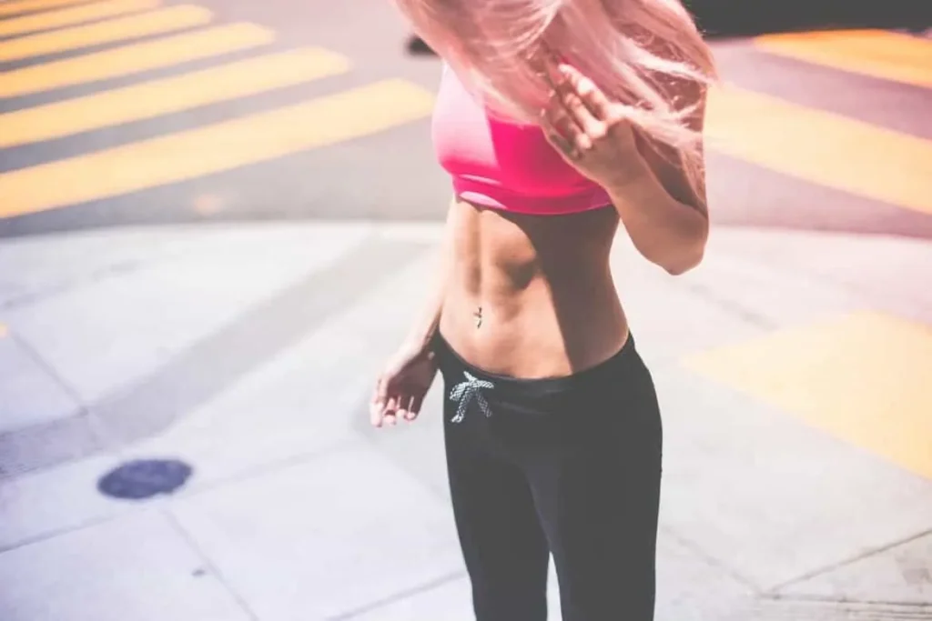 Woman with toned stomach after LA-EMS Body Sculpting Treatment Chesham 